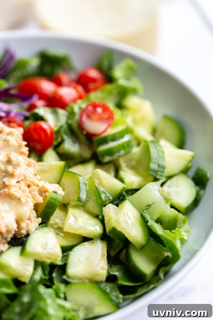 creamy garlic dressing over salad greens