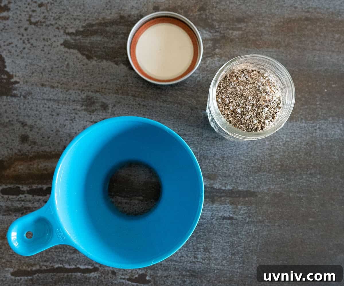 Ultimate Steak Rub Recipe for Bold, Smoky Flavor 6 steak rub in a jar with a canning funnel