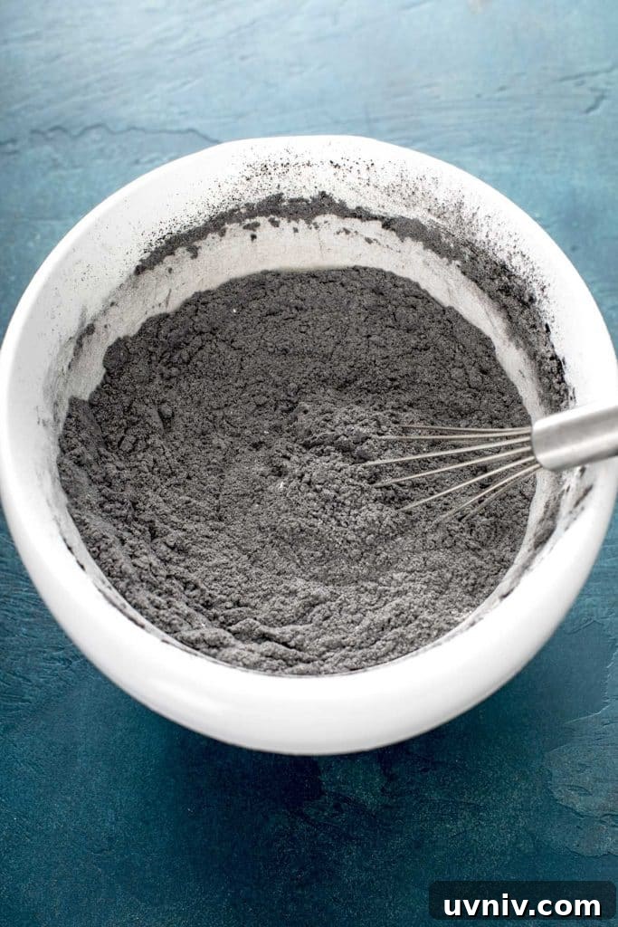flour, sugar, cocoa powder, baking soda, baking powder and salt in a large white bowl