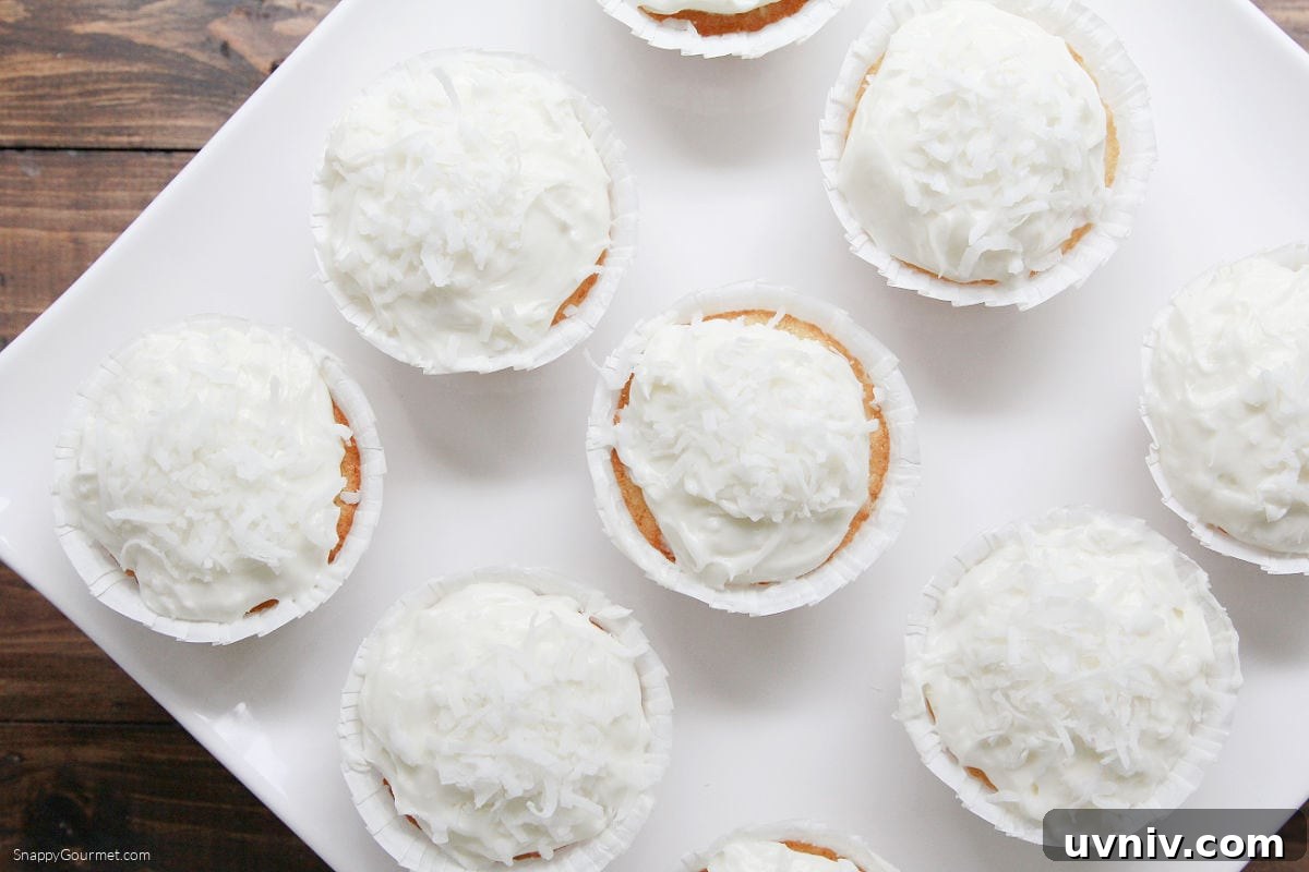 Coconut Cupcakes on cake stand