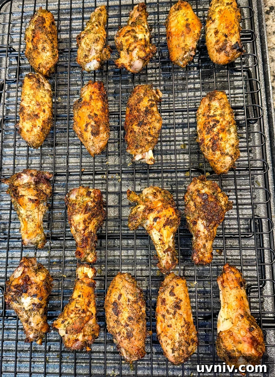 Crispy Ranch Chicken Wings Recipe for Game Day and Parties 6 crispy ranch wings on a baking rack