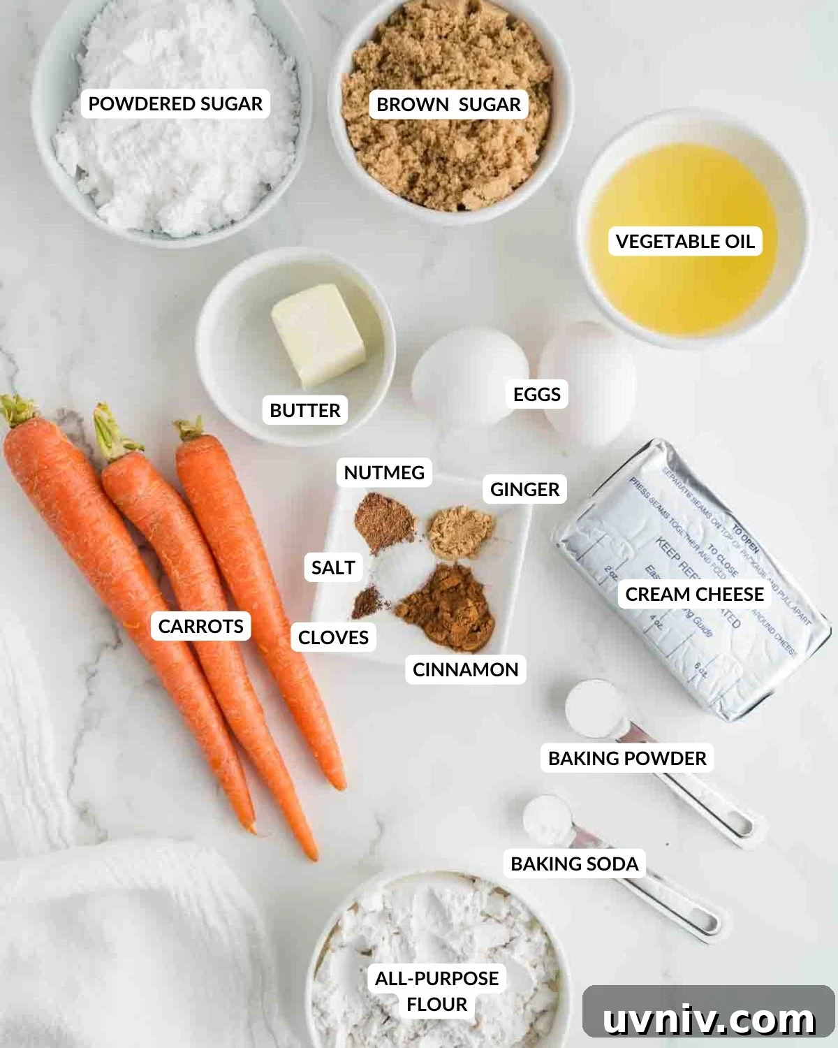 Moist Carrot Cake Loaf with Cream Cheese Glaze 3 An overhead image of the ingredients of carrot cake loaf.