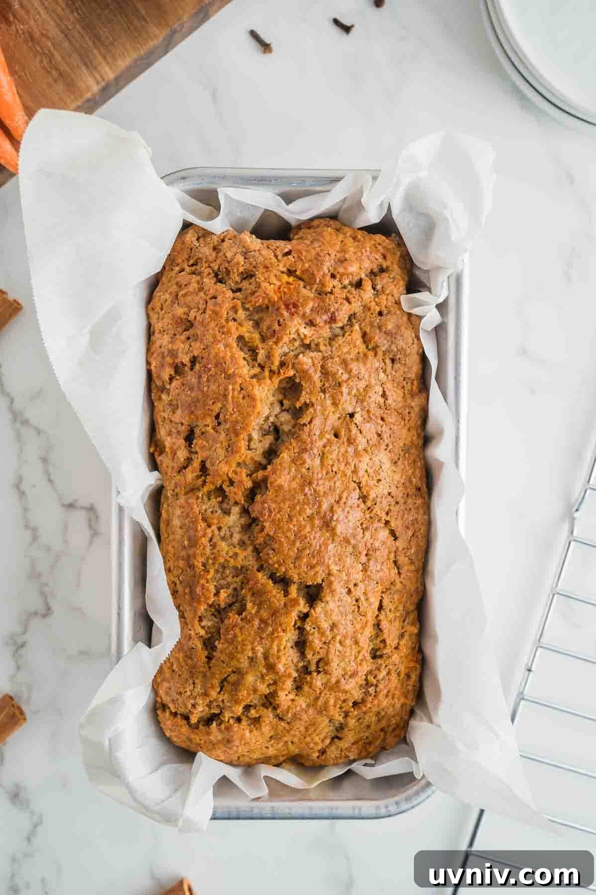 Moist Carrot Cake Loaf with Cream Cheese Glaze 9 An overhead image of the baked carrot cake loaf.