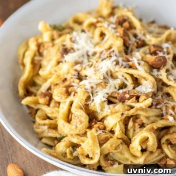 almond pesto fettuccine in white bowl