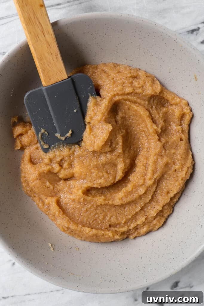 Paleo Apple Cinnamon Donut Holes Recipe — Gluten-Free Bites 5 Batter in mixing bowl.