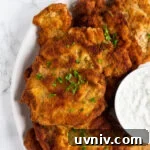 Crispy Pork Schnitzel Recipe with Lemon Butter Sauce 10 a plate of pork schnitzel