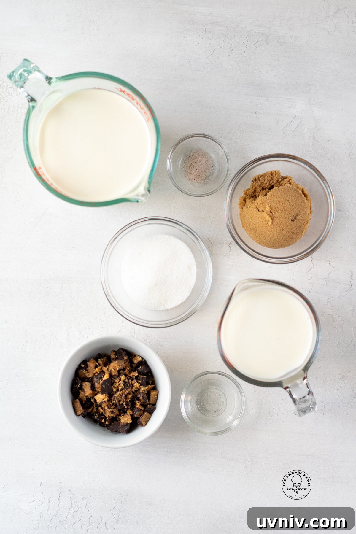 The ingredients needed to make homemade butter brickle ice cream, including cream, milk, brown sugar, and toffee pieces.