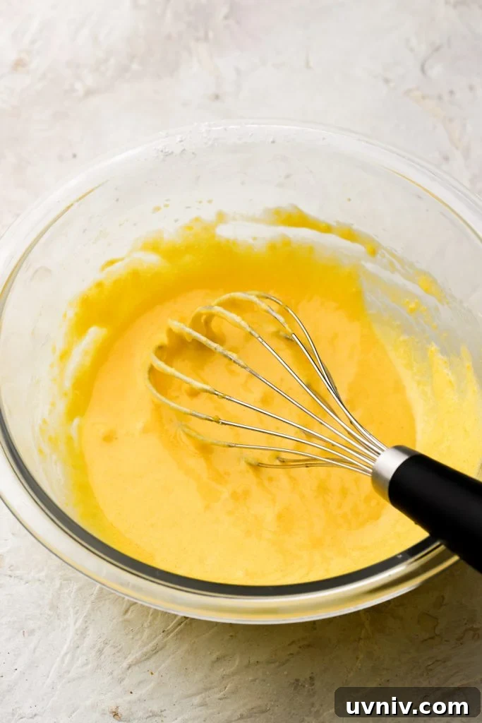 Party-Size Vanilla Birthday Sheet Cake Recipe 13 egg yolks whisked with sugar and cornstarch - smooth