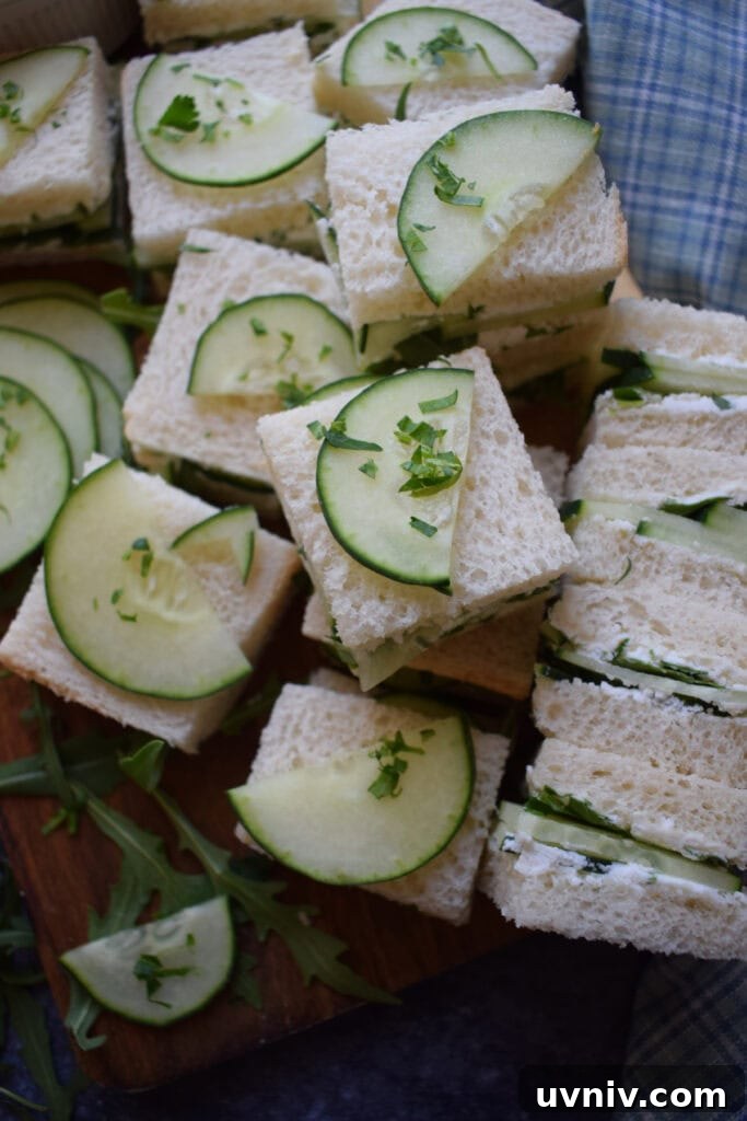 Cucumber sandwiches cut into small squares.