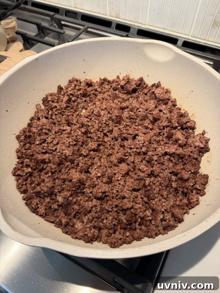 Smash Burger Sloppy Joes Recipe — Crispy Beef Sloppy Joe Sandwiches 3 Ground beef in a pan