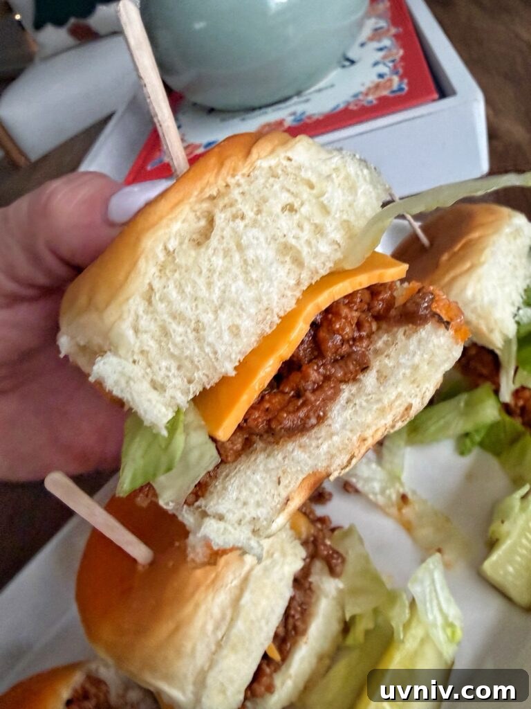 Smash Burger Sloppy Joes Recipe — Crispy Beef Sloppy Joe Sandwiches 6 A finished sloppy joe being held