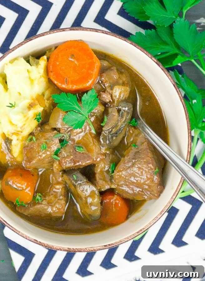 19 Irish-Inspired Recipes to Try This St. Patrick’s Day 19 Beef and Guinness Stew in white bowl with mashed potatoes