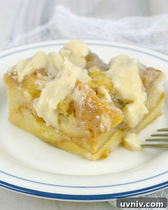 19 Irish-Inspired Recipes to Try This St. Patrick’s Day 3 Irish Cream Custard Bread Pudding on white plate with fork tines