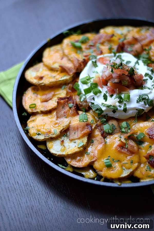 19 Irish-Inspired Recipes to Try This St. Patrick’s Day 5 Irish Nachos on circular serving tray