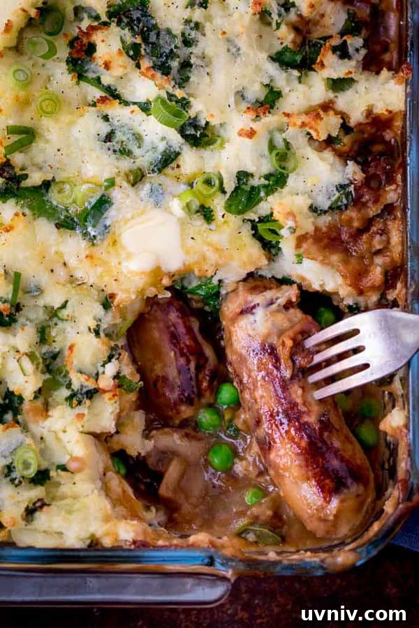 19 Irish-Inspired Recipes to Try This St. Patrick’s Day 9 Sausage and Colcannon Bake with a sausage on a fork