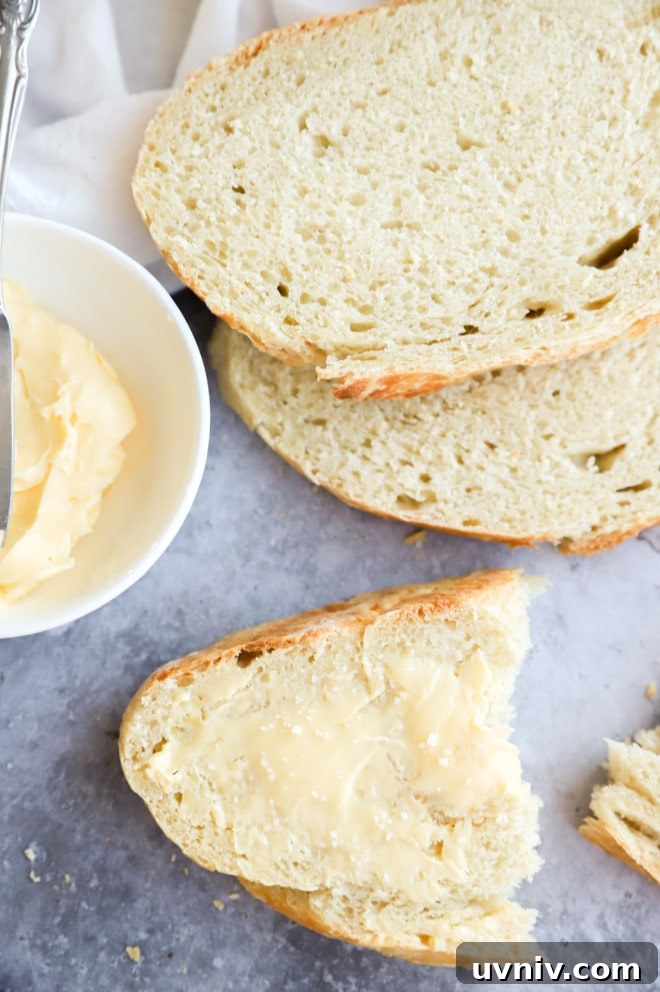 No-Knead Overnight Bread Recipe for Perfect Rustic Loaves 9 Bread slices with butter and salt picture