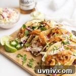 Shrimp Tacos with Coleslaw and Avocado Crema
