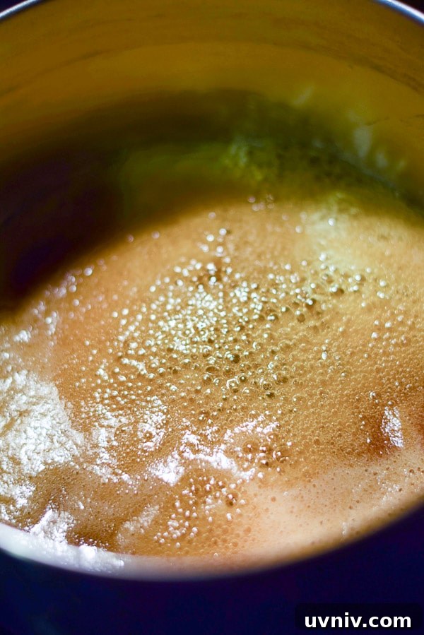 How to Make Soft, Chewy Caramels at Home 4 honey and sugar melted in a pan