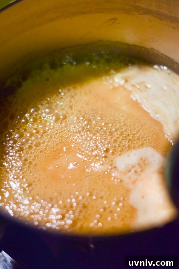 How to Make Soft, Chewy Caramels at Home 5 Bubbly cream and butter in the pan