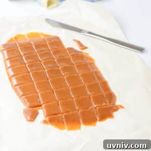 Cut caramels on parchment paper