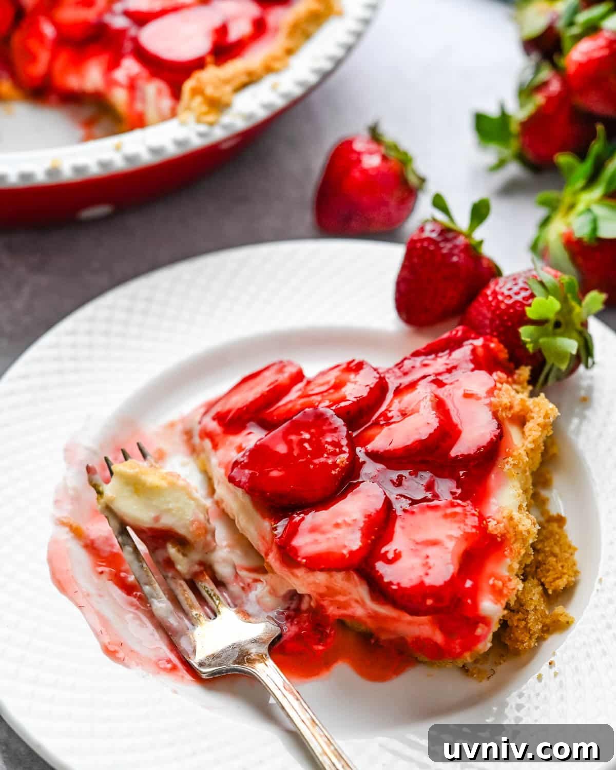Enjoying a slice of the strawberry pie.