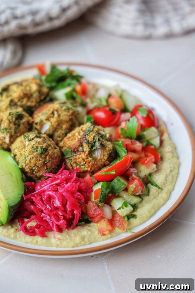 Low-Carb Chickpea-Free Falafel Recipe for Keto and Low-Carb Diets 3 A hummus plate with cauliflower falafel.