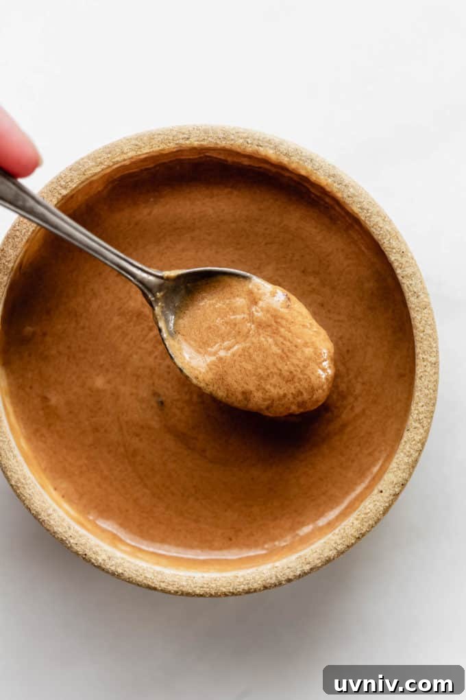 Crispy Baked Peanut Butter Tofu with Sticky Soy Glaze 6 A spoon of Thai peanut sauce