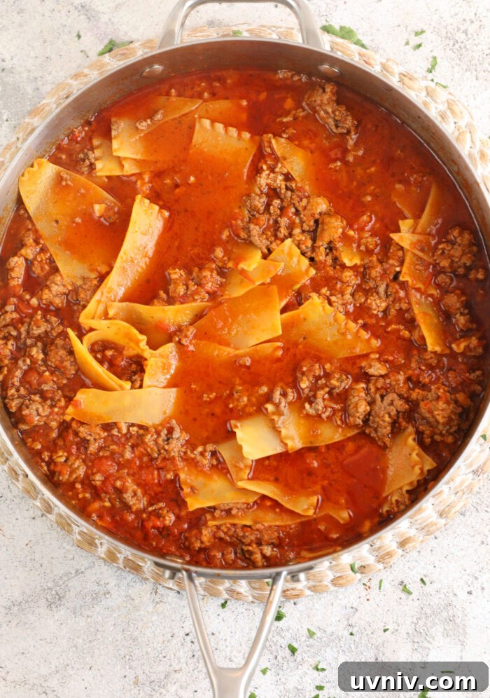 Lasagna cooking in skillet