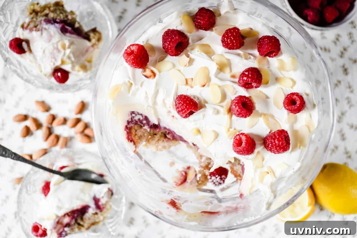 Gluten-Free Lemon and Raspberry Trifle Recipe for Spring Desserts 3 A large bowl of trifle from above with a huge scoop taken out