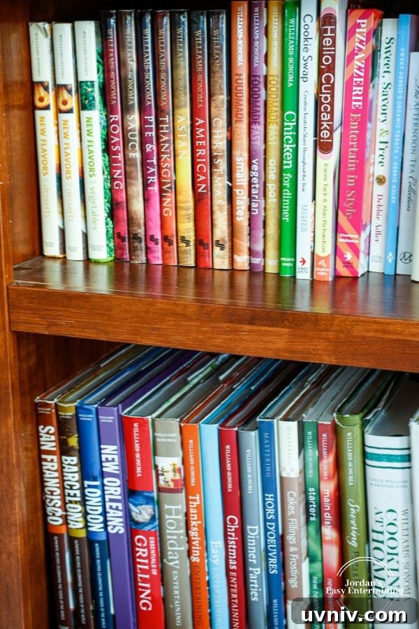 Williams Sonoma cookbooks on a bookcase