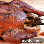 Top Side Dishes to Serve with Smoked Turkey 4 Smoked Turkey Brine Recipe Plus Dry Rub And Butter Injection Cooked on cutting board