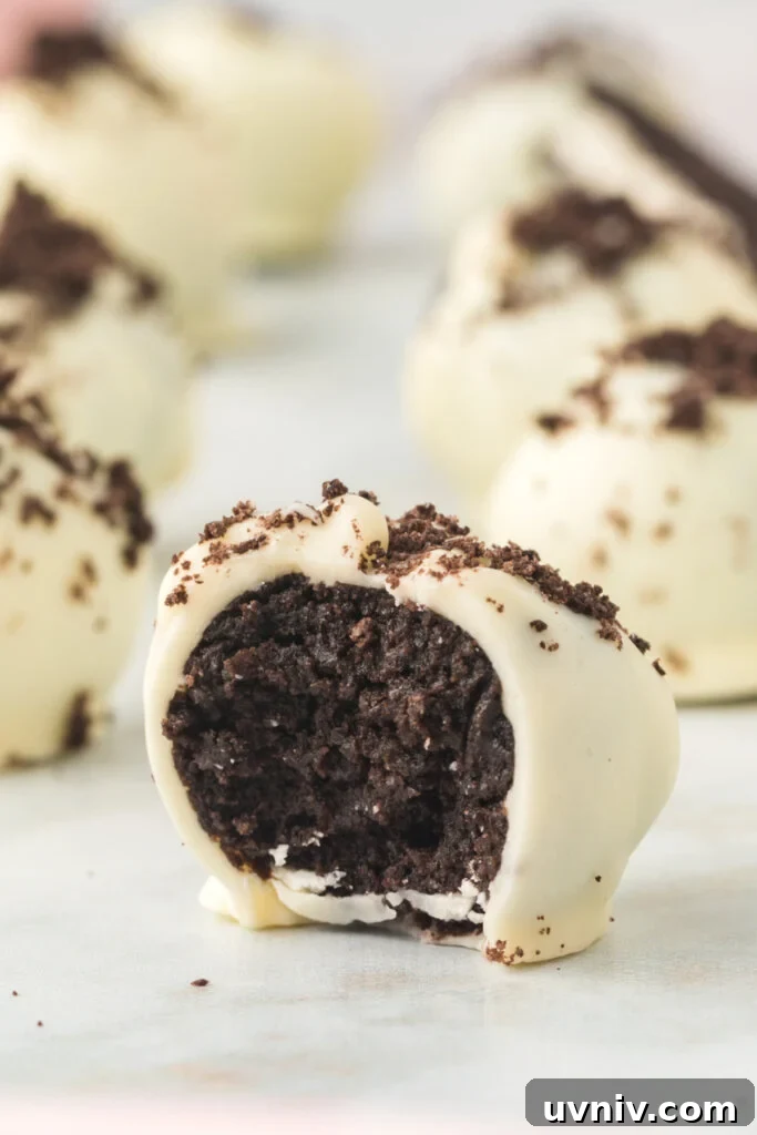 Decadent Oreo Truffles: Bite-Sized Chocolate Dessert Recipe 3 closeup of oreo truffle showing the inside