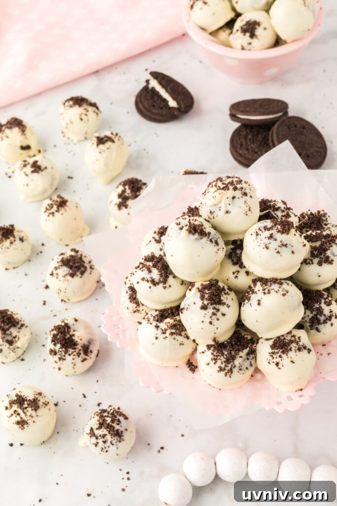 Decadent Oreo Truffles: Bite-Sized Chocolate Dessert Recipe 4 oreo truffles on table
