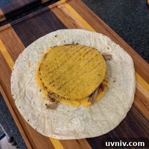 Crunchwrap Supreme with Pulled Pork: Copycat Recipe & Tips 16 tostada shell over toppings and a tortilla