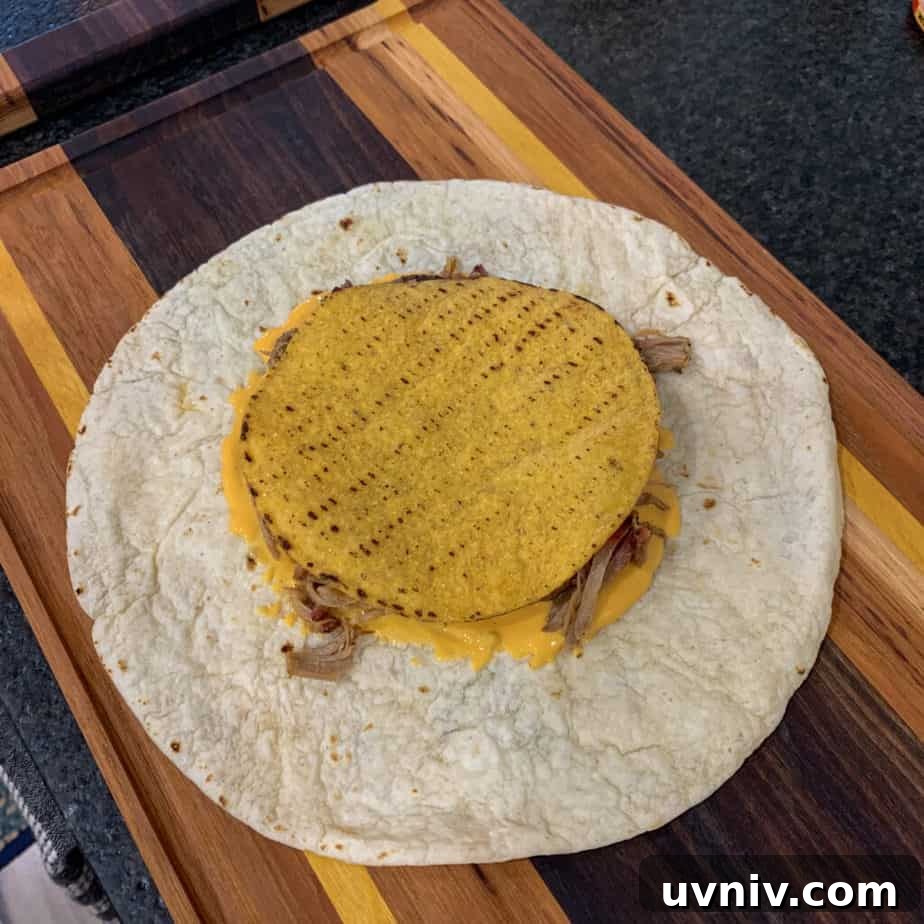 Crunchwrap Supreme with Pulled Pork: Copycat Recipe & Tips 6 tostada shell over toppings and a tortilla