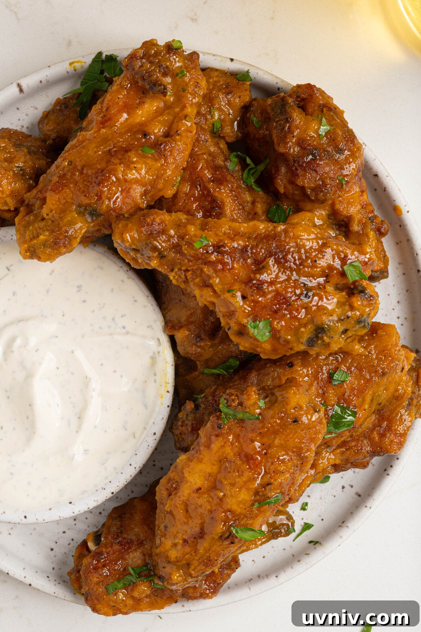Mango Habanero Chicken Wings with Sticky Glaze 11 A plate of mango habanero wings.