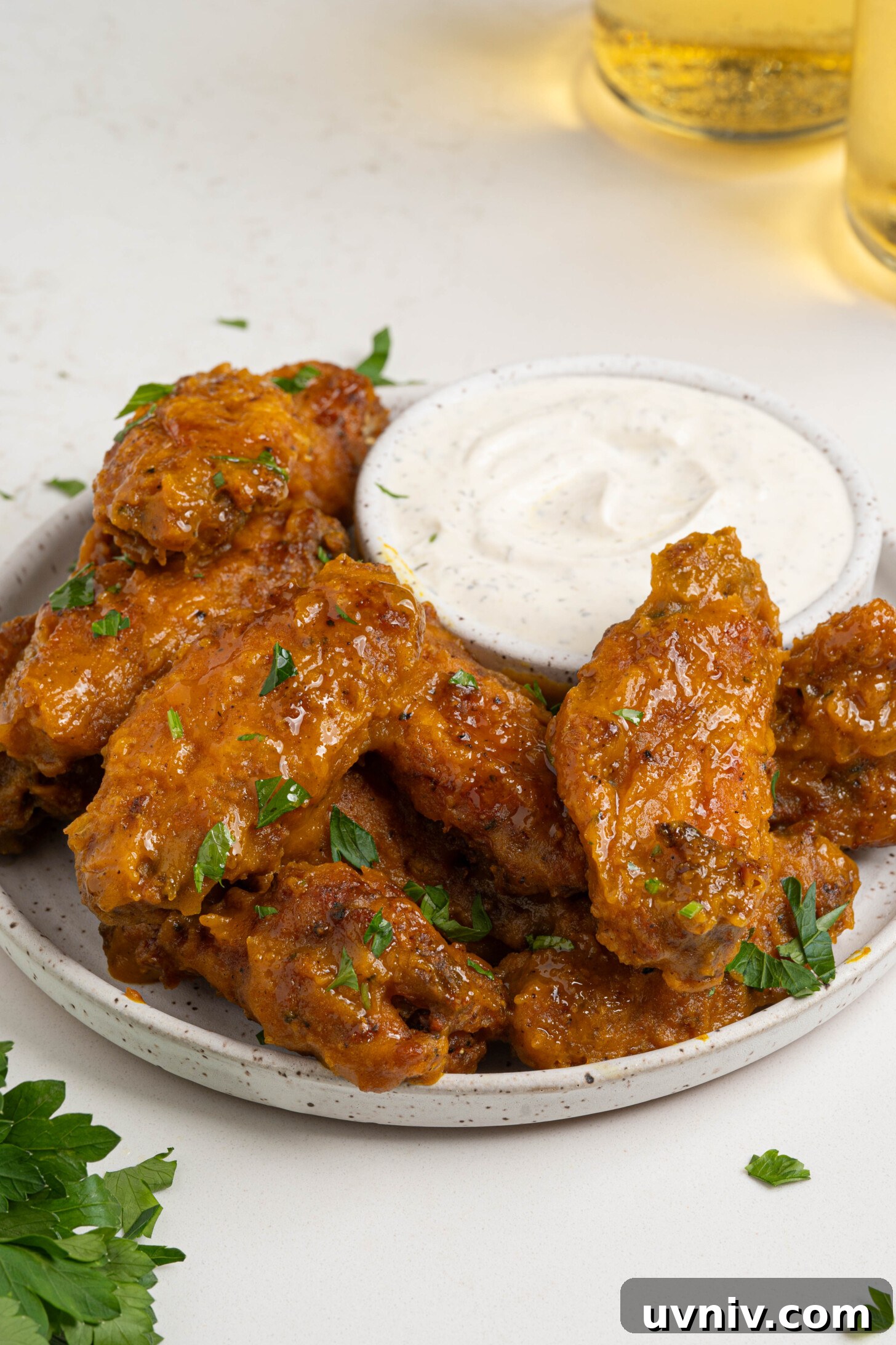 Mango Habanero Chicken Wings with Sticky Glaze 3 A plate of mango habanero wings.