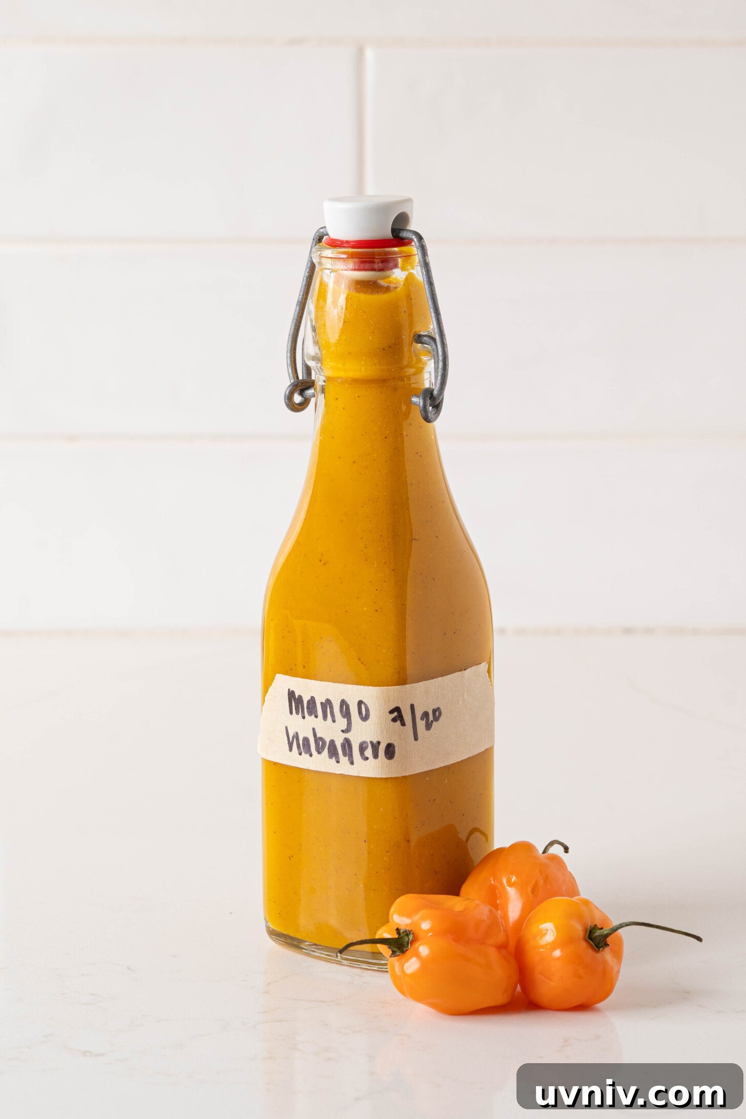 Mango Habanero Chicken Wings with Sticky Glaze 10 A bottle of mango habanero hot sauce.
