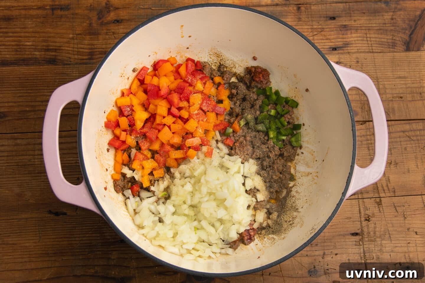 Creamy Beef Taco Soup Recipe — Comforting Weeknight Meal 5 This is a picture of the pot with veggies added to the beef.
