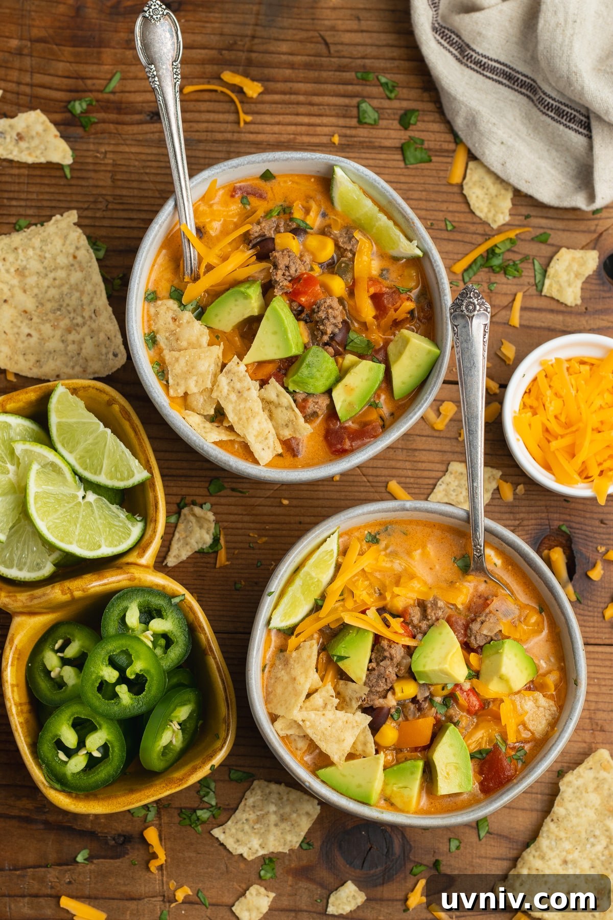 Creamy Beef Taco Soup Recipe — Comforting Weeknight Meal 10 This is a picture of two bowls filled of creamy beef taco soup.