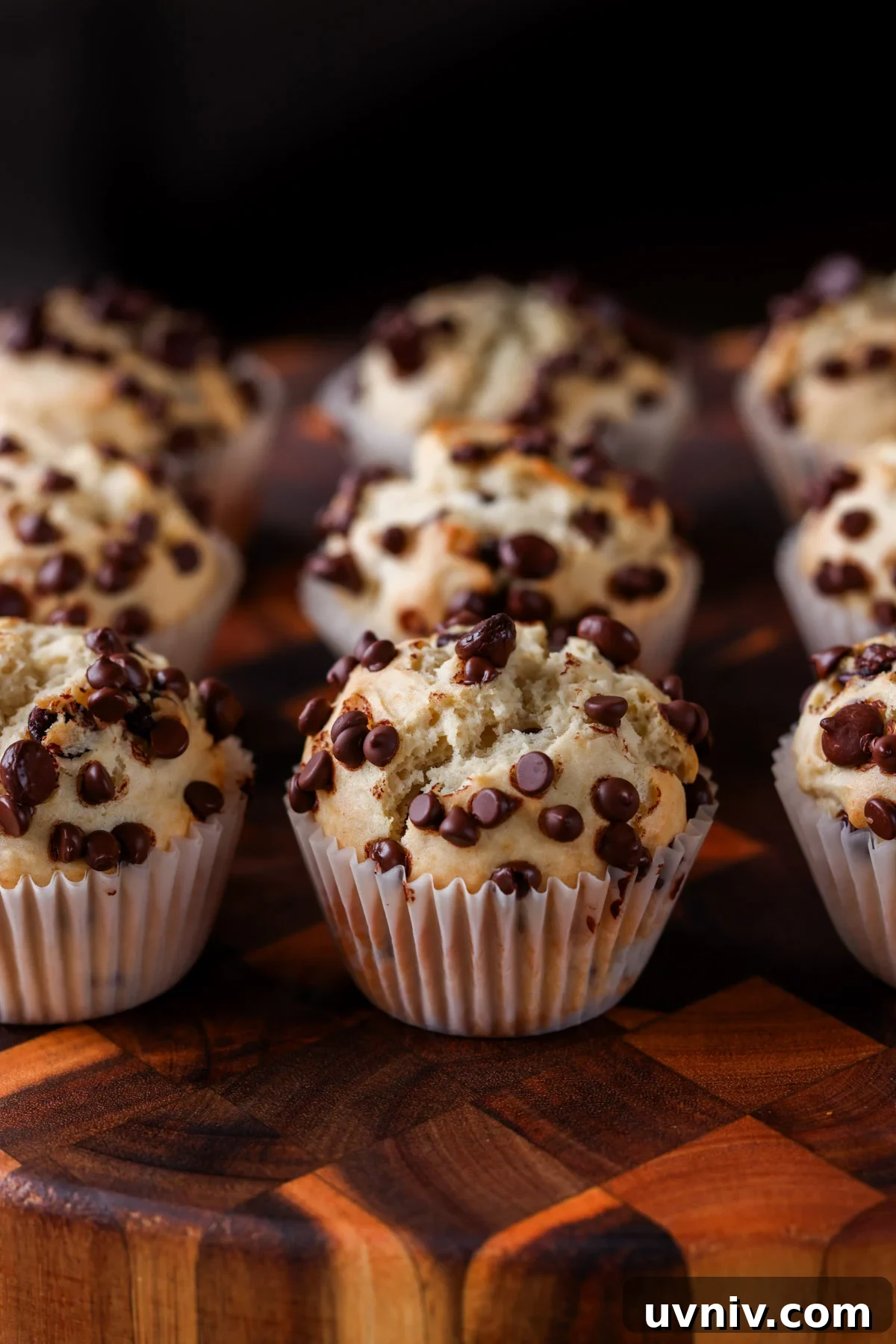 chocolate chip muffins on a cutting board