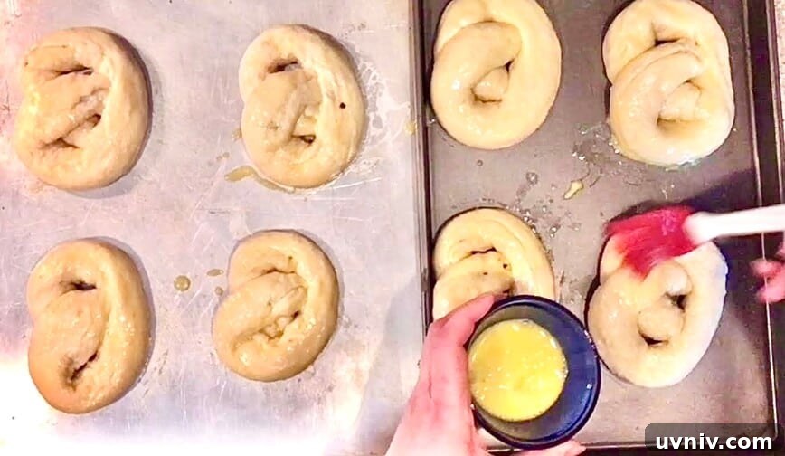 Spinach Artichoke-Stuffed Beer Soft Pretzels 13 Brushing on the egg wash