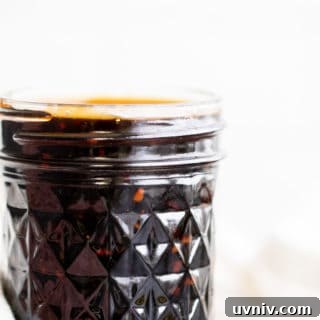 Homemade Teriyaki Sauce Recipe: Sweet Savory Marinade for All Dishes 3 Teriyaki sauce in a glass mason jar.