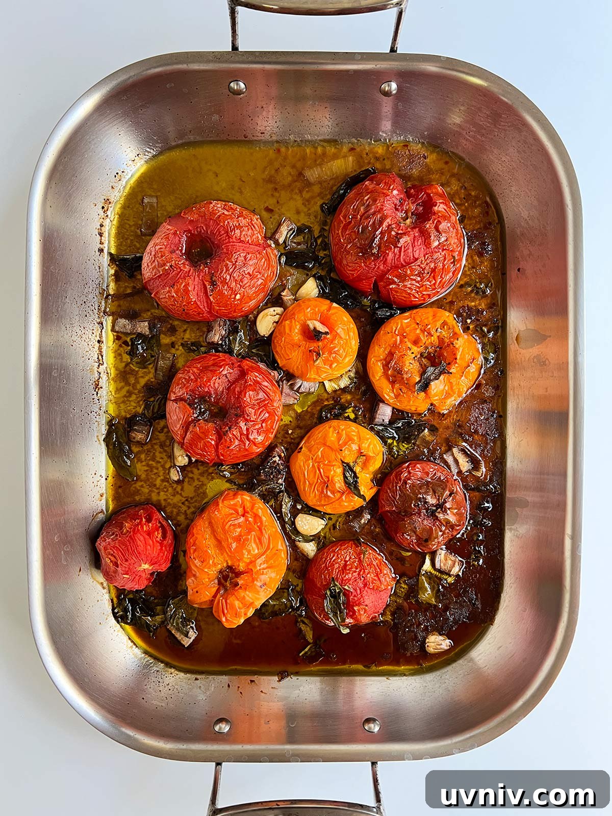 Roasted Tomato Sauce Recipe — Rich Flavor in Minutes 5 Roasted tomato pasta sauce done and still in the roasting pan.
