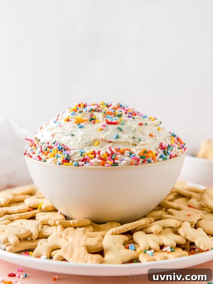 Funfetti Cake Dip Recipe — Party-Friendly Dessert Dip 3 animal crackers in sprinkle covered cake dip