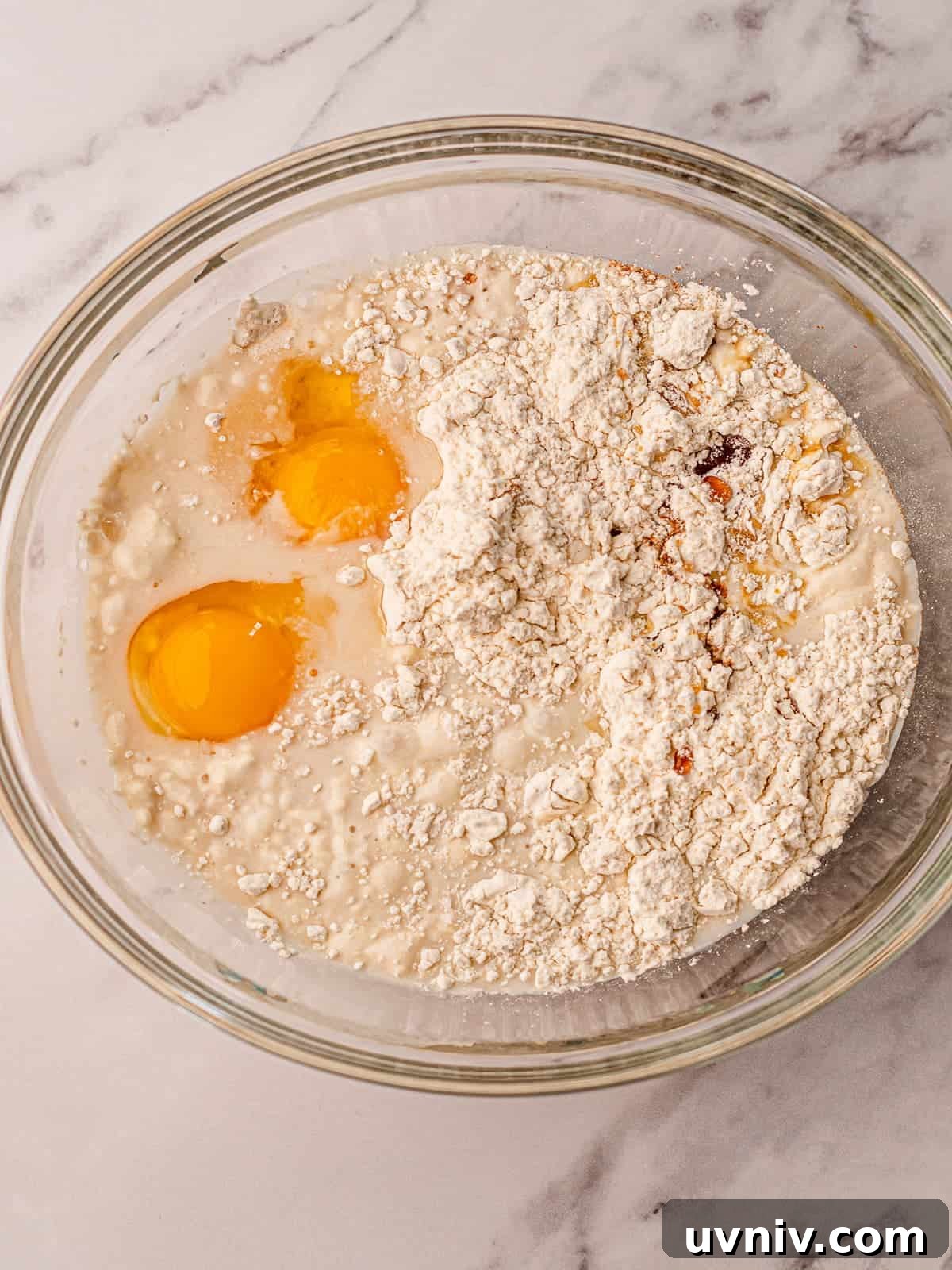 Waffle ingredients in a bowl before mixing.