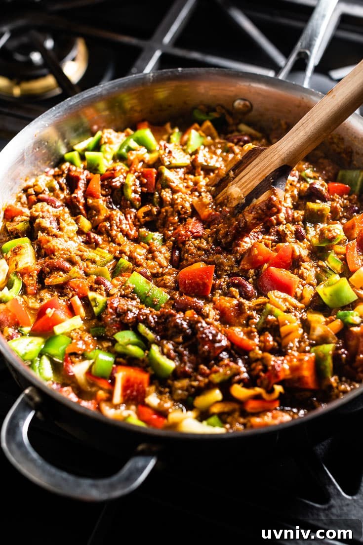 Hearty Vegetarian Chili Recipe for Flavorful Meatless Meals 5 making vegetarian chili in saute pan with peppers
