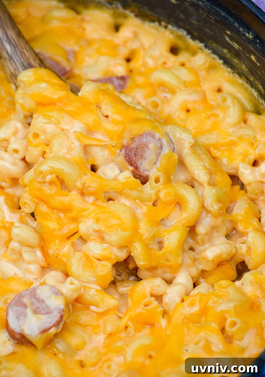 Firehouse-Style Macaroni and Cheese Recipe 4 firehouse mac and cheese with hot dogs in a heavy bottomed pot