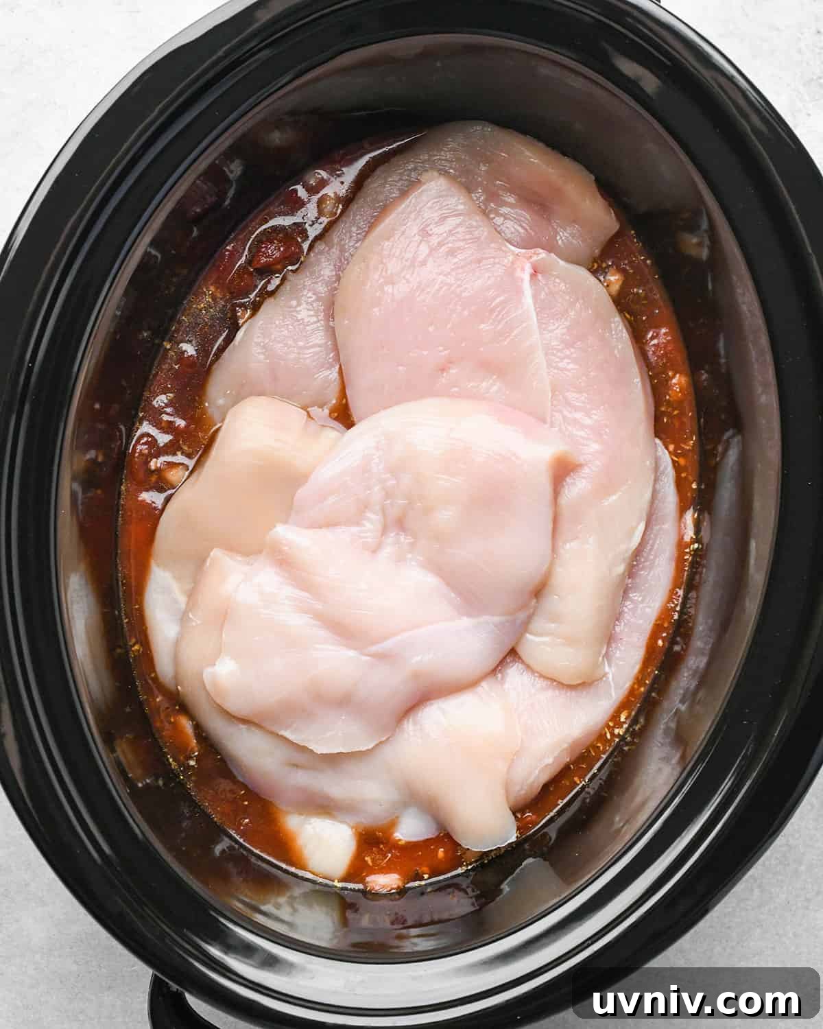 Slow Cooker Italian Chicken Recipe for Tender, Flavorful Meals 8 chicken breasts added to the sauce before mixing in this crockpot italian chicken recipe