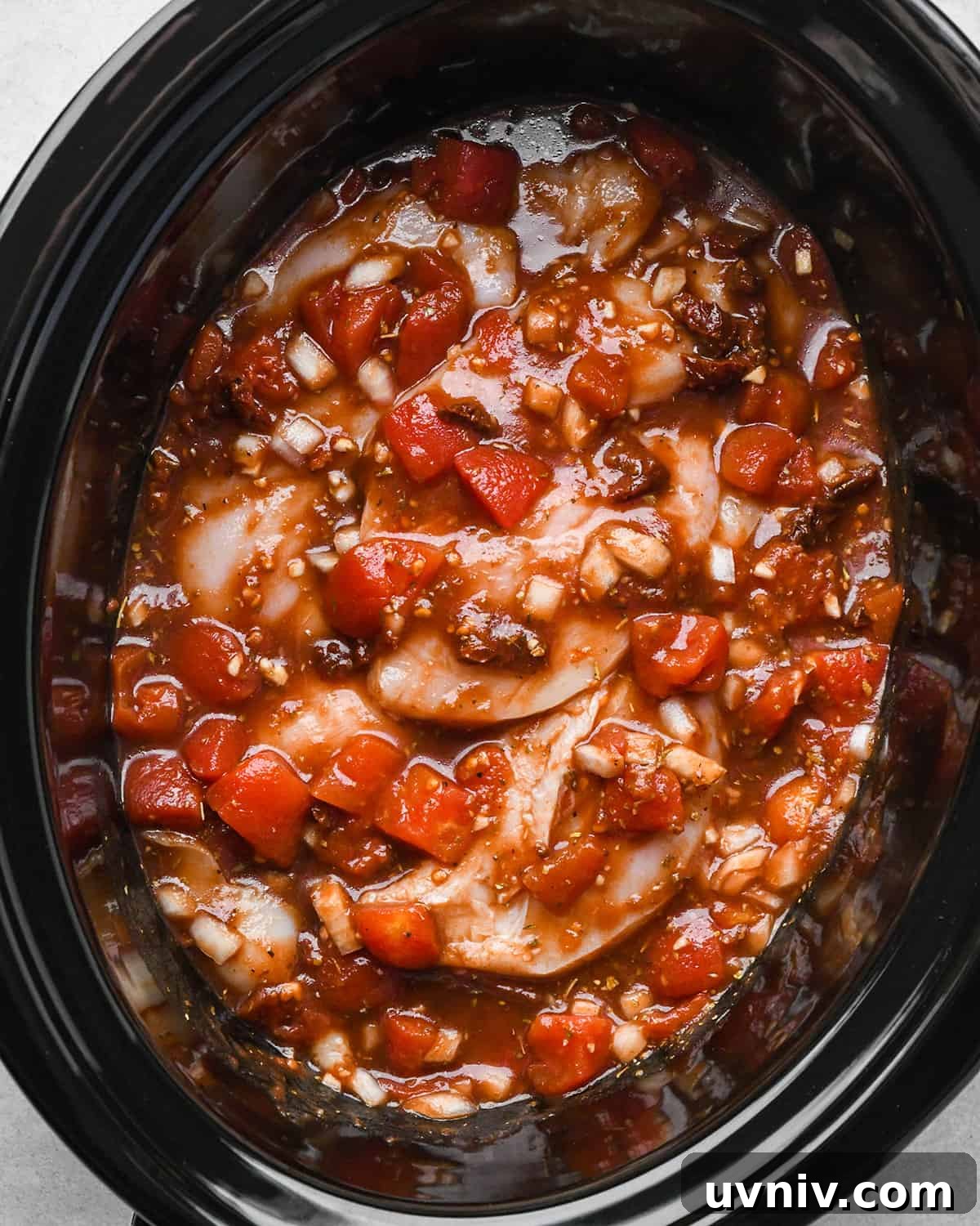 Slow Cooker Italian Chicken Recipe for Tender, Flavorful Meals 9 chicken breasts added to the sauce after mixing before cooking in this crockpot italian chicken recipe